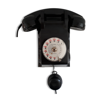 Téléphone mural en bakélite noir vintage années 50