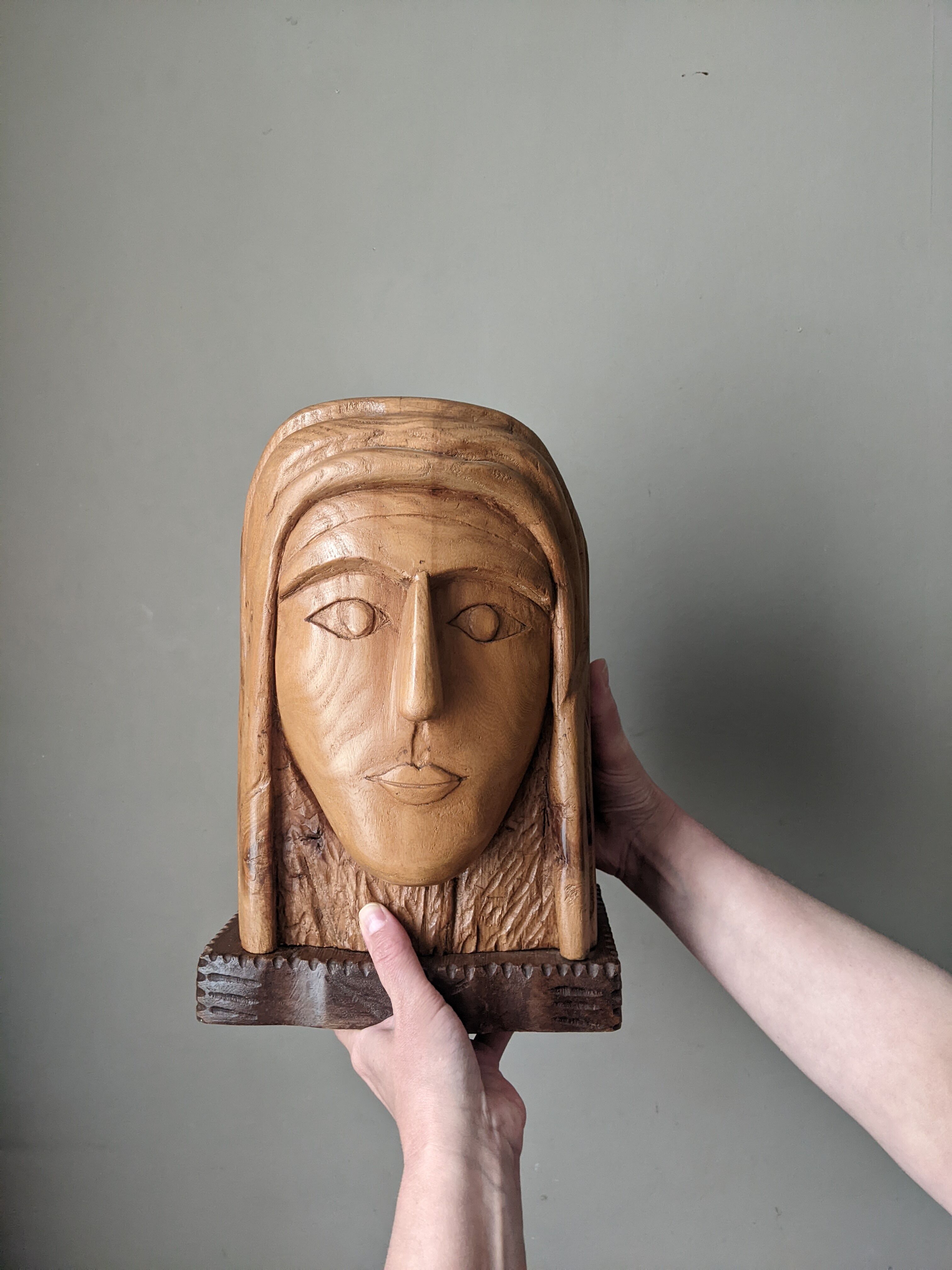 Handcrafted sculpture of the head of Christ in elm.