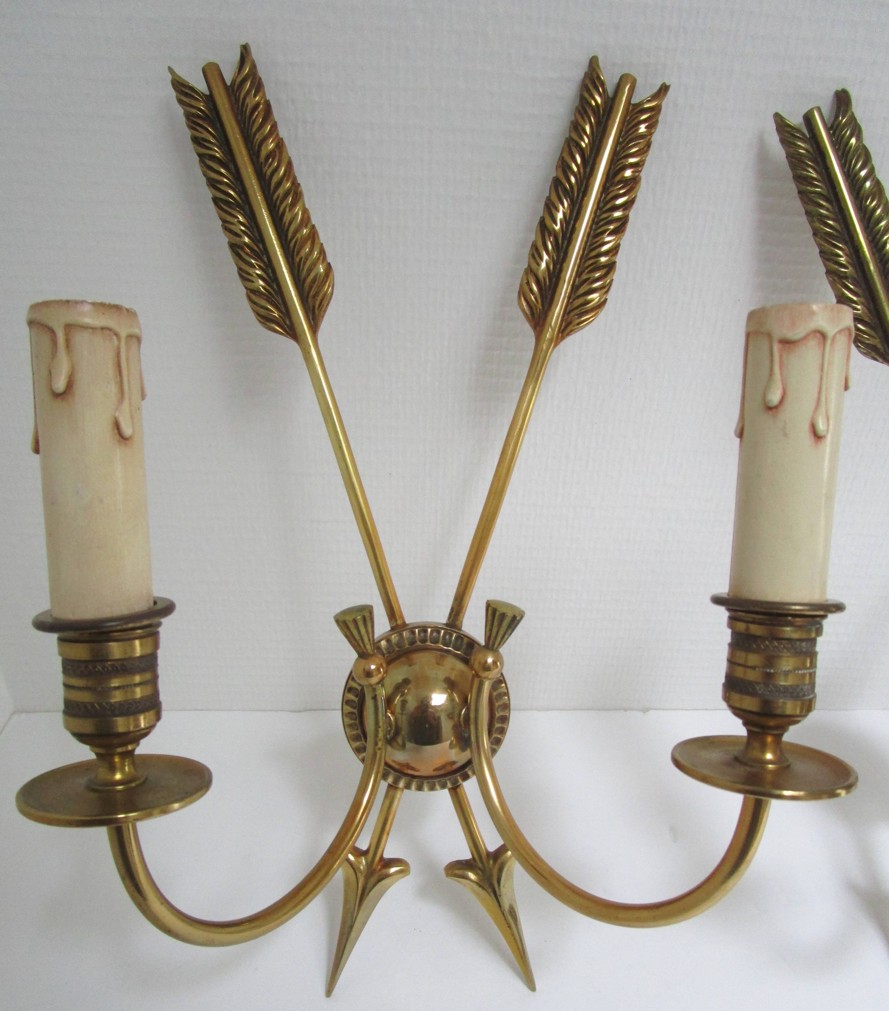 Pair of bronze crossed arrow wall lights Lucien Gau