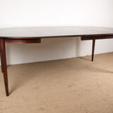 Danish extendable dining table in Rio Rosewood model 55 by Arne Vodder for Sibast 1958.