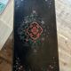 Small Chinese cabinet in black lacquer.