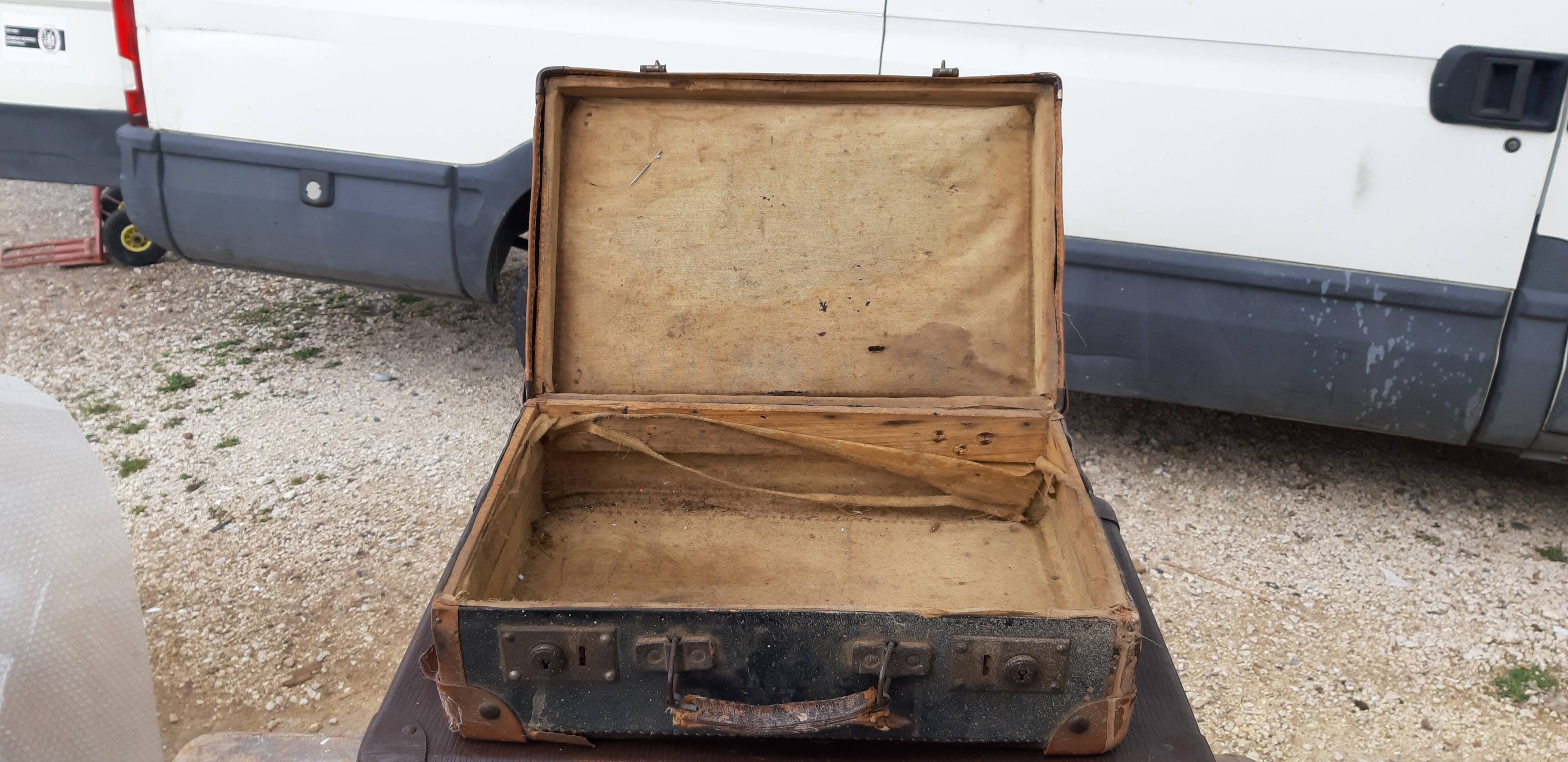 3 vintage suitcases