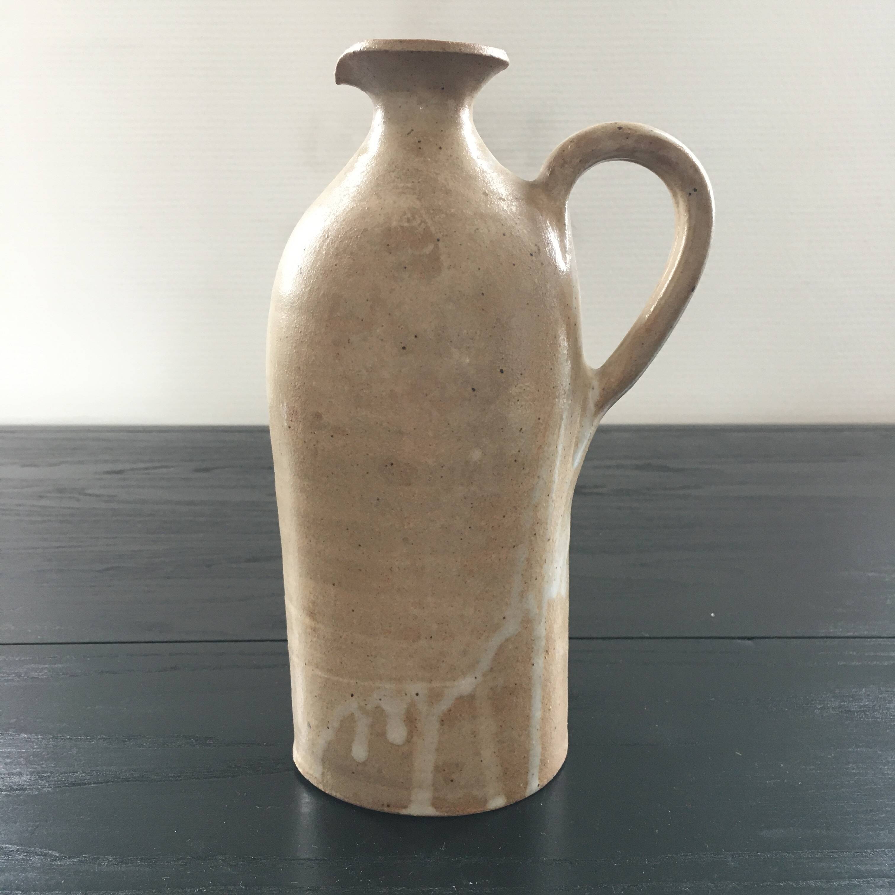 Beige stoneware bottle