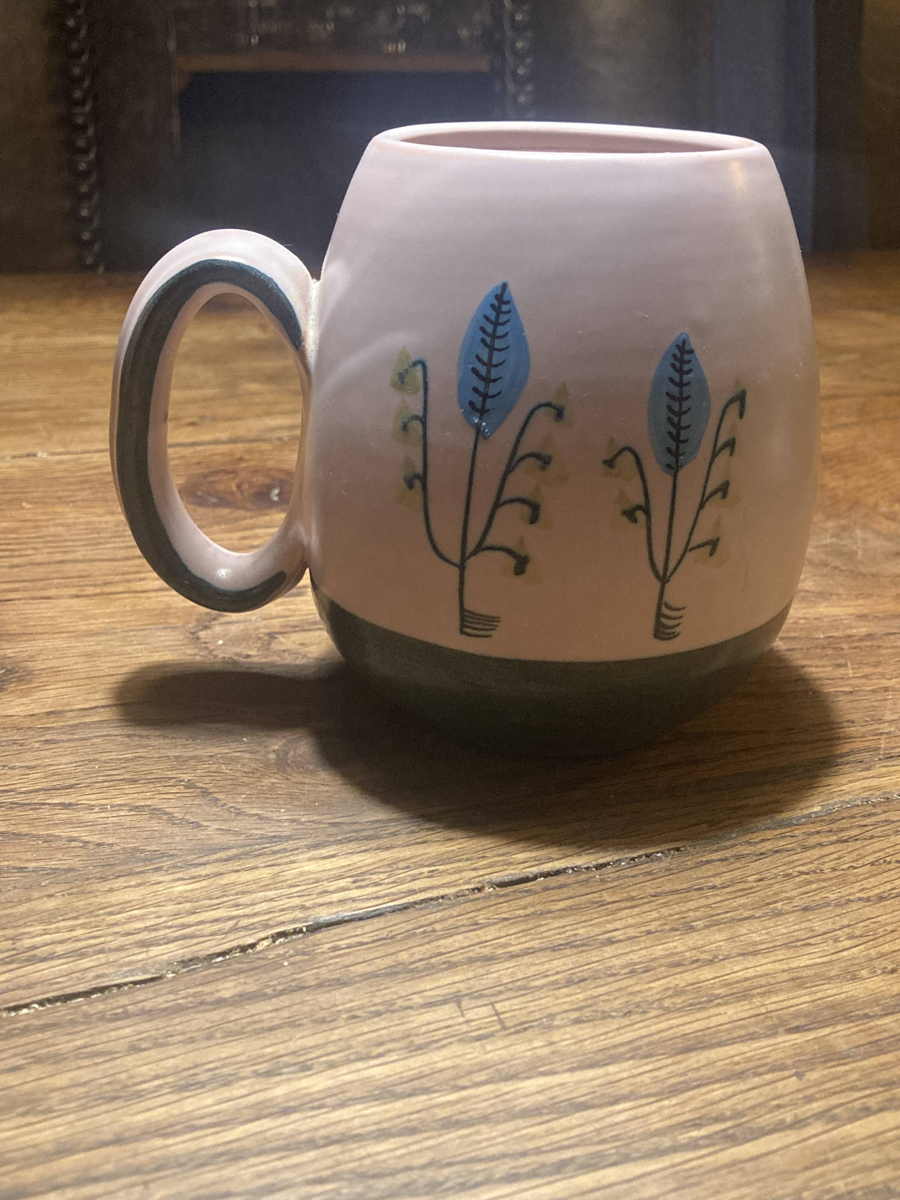 Set of two ceramic mugs signed Yvon ROY