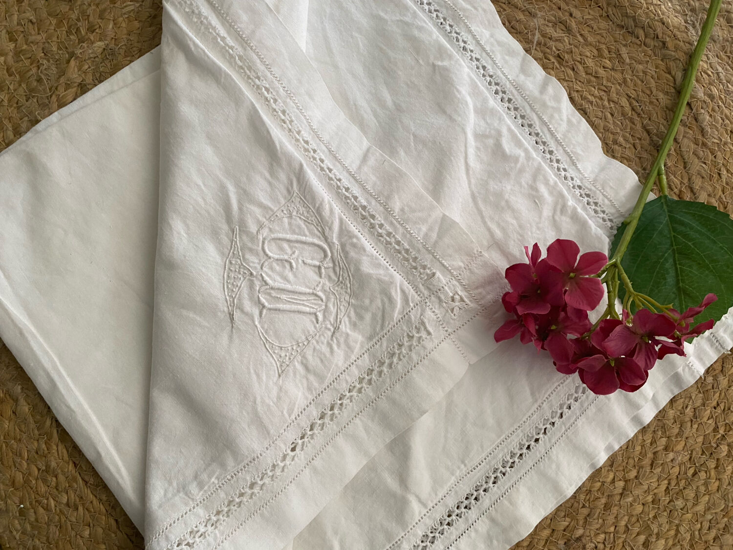 White cotton pillowcase with embroidery and monogram from the 1960s.