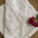 White cotton pillowcase with embroidery and monogram from the 1960s.