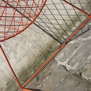 Orange lattice armchair