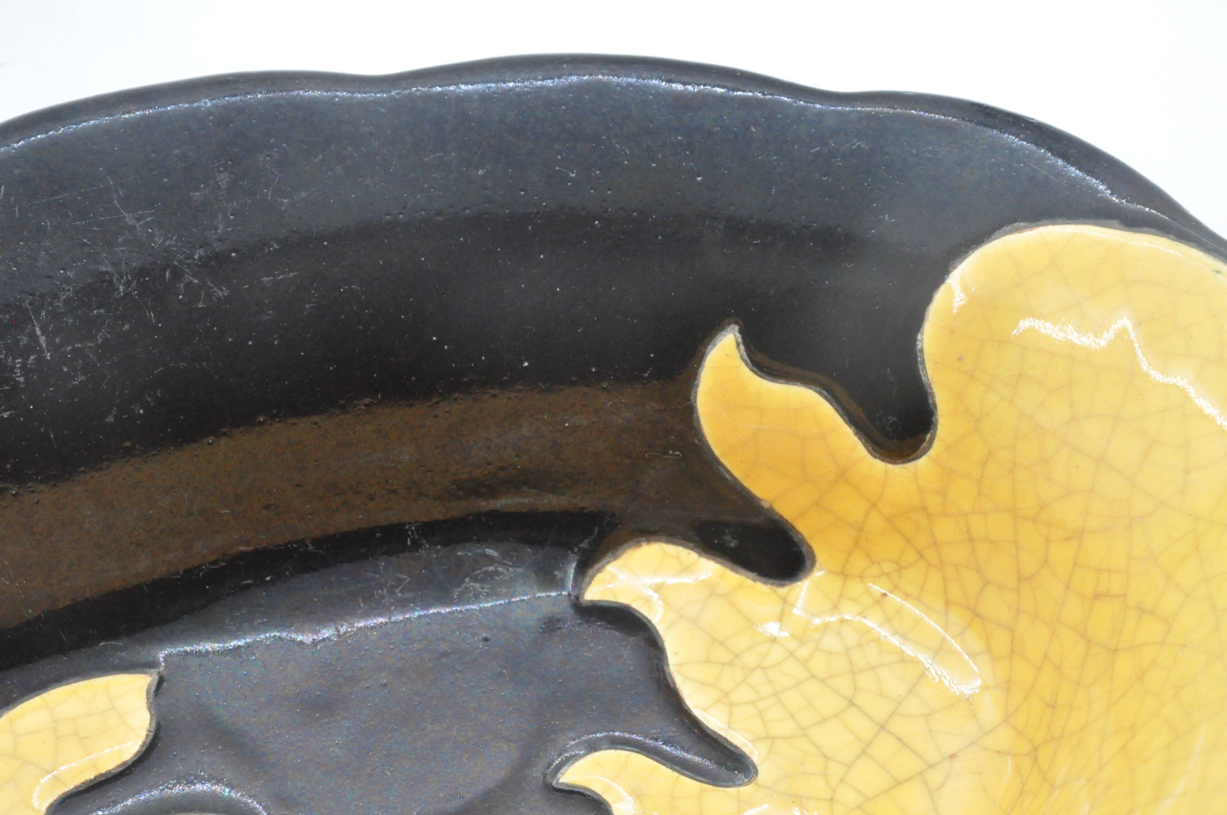 Old dish in enamels from longwy ombre et lumière collection ceramic design