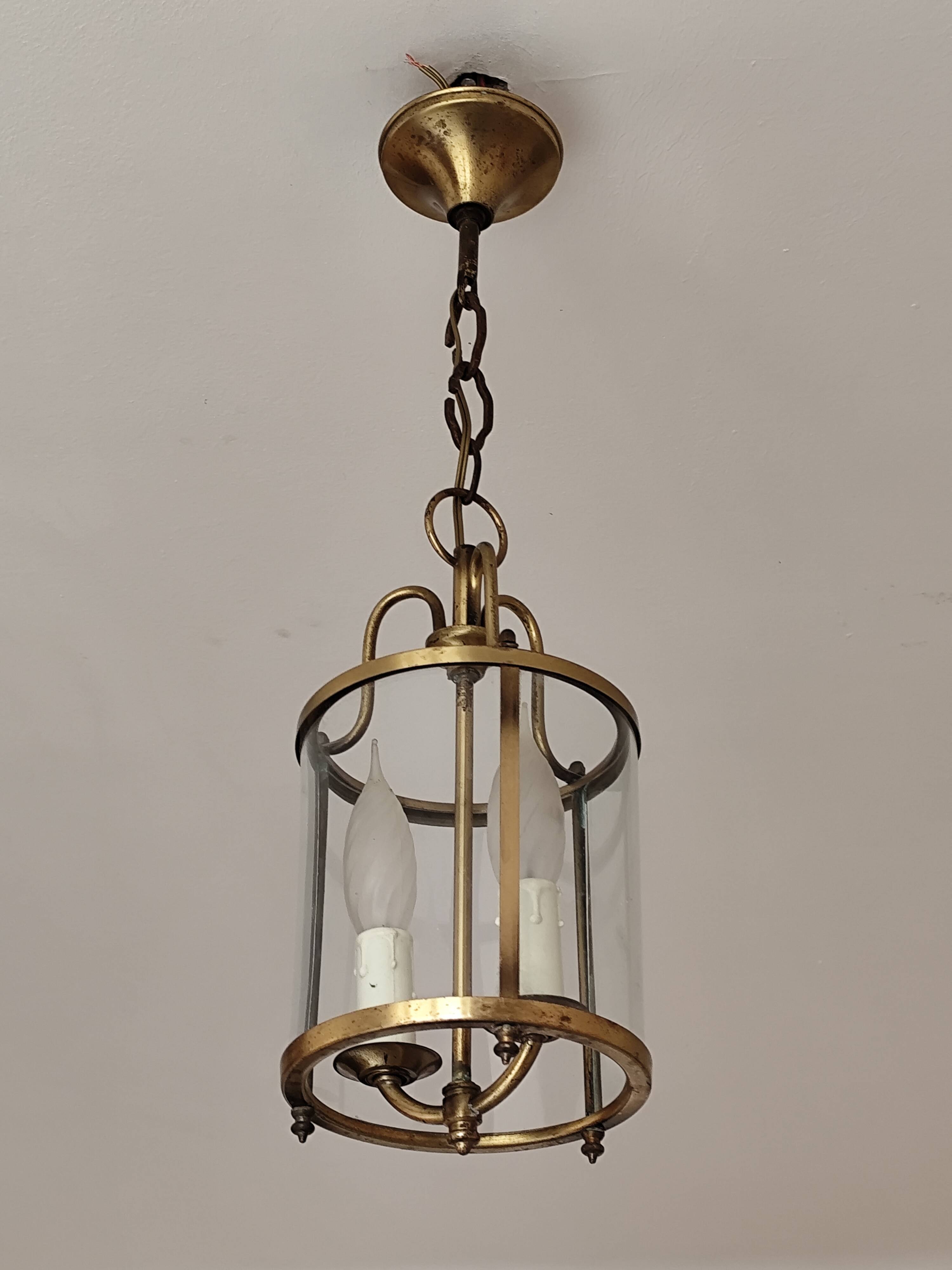Cylindrical brass and glass lantern in Louis XVI style.