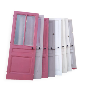 Series of 9 old communication doors, solid wood, both solid and glazed.