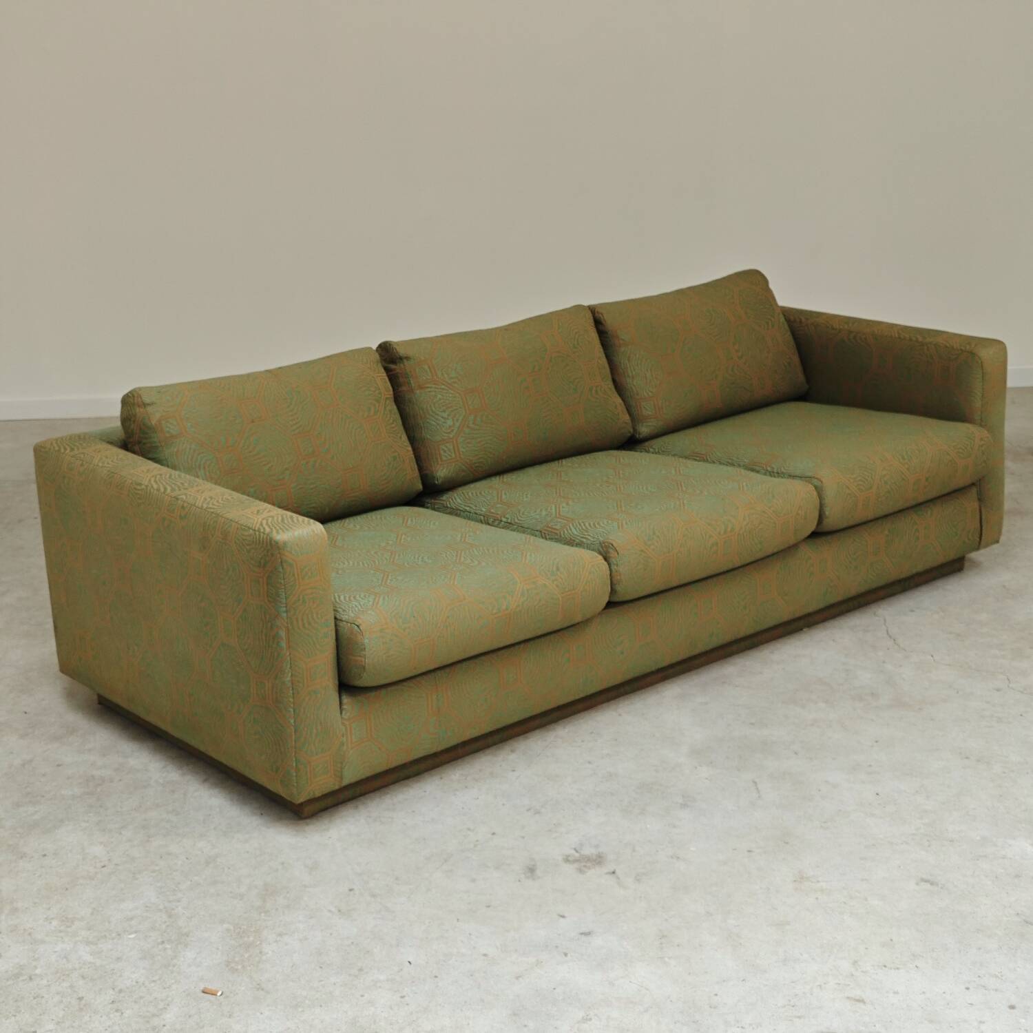 Pierre Frey modernist bench in green and gold patterned fabric