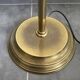 Reading lamp, floor lamp, adjustable arm lamp.