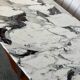 Large console in Calacatta Viola marble & solid cherry wood.