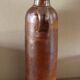 Bouteille liqueur grès vintage poignée