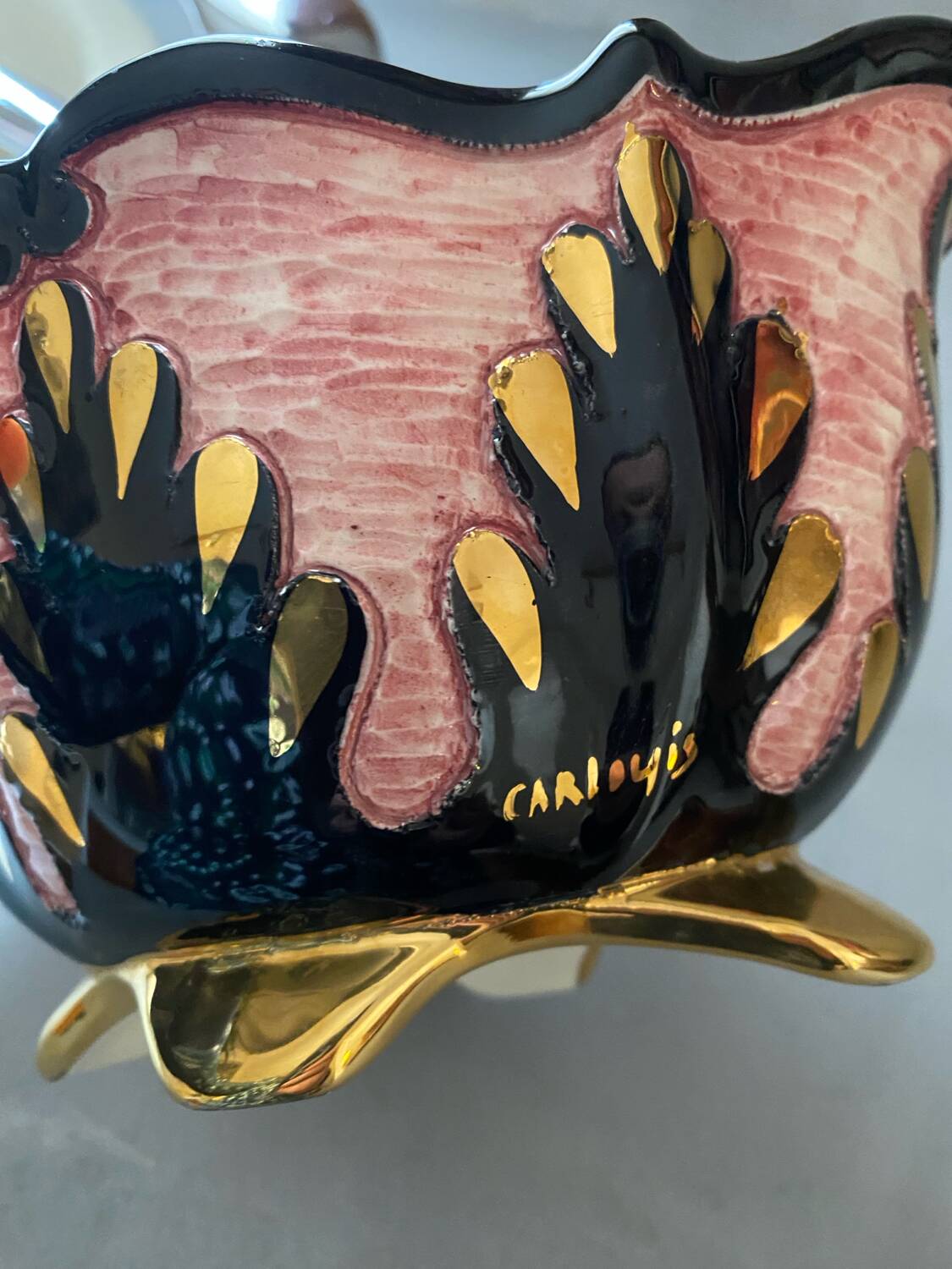 Signed pink gold ceramic candy dish