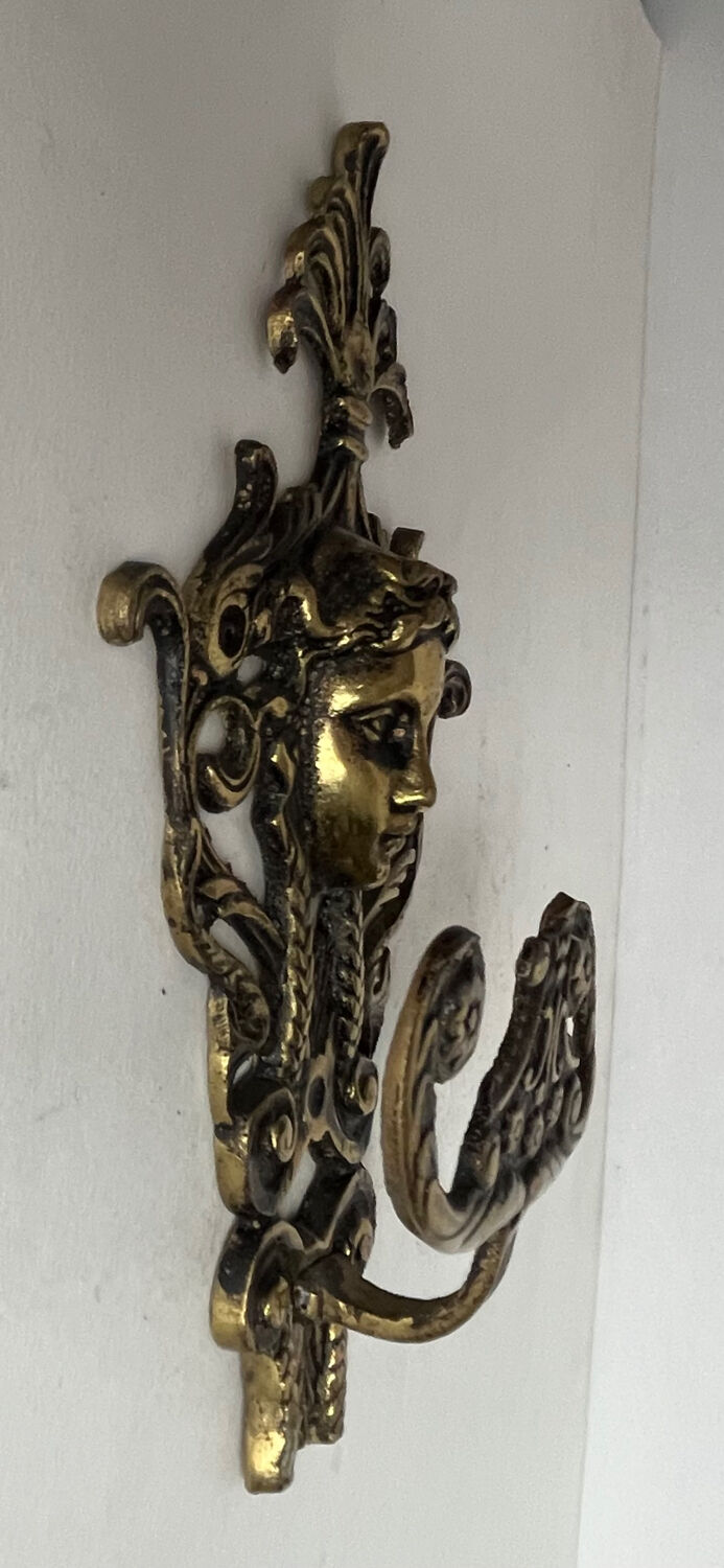 Antique hook in gilded bronze