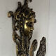 Antique hook in gilded bronze