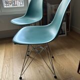4 Eames chairs in turquoise blue color