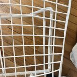 2 white Bertoia chairs