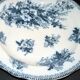 Large round antique plate with monochrome blue and black floral decoration, circa 1850.