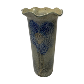 Artisanal vase in gray sandstone flower pattern