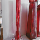 Set of three red bottles