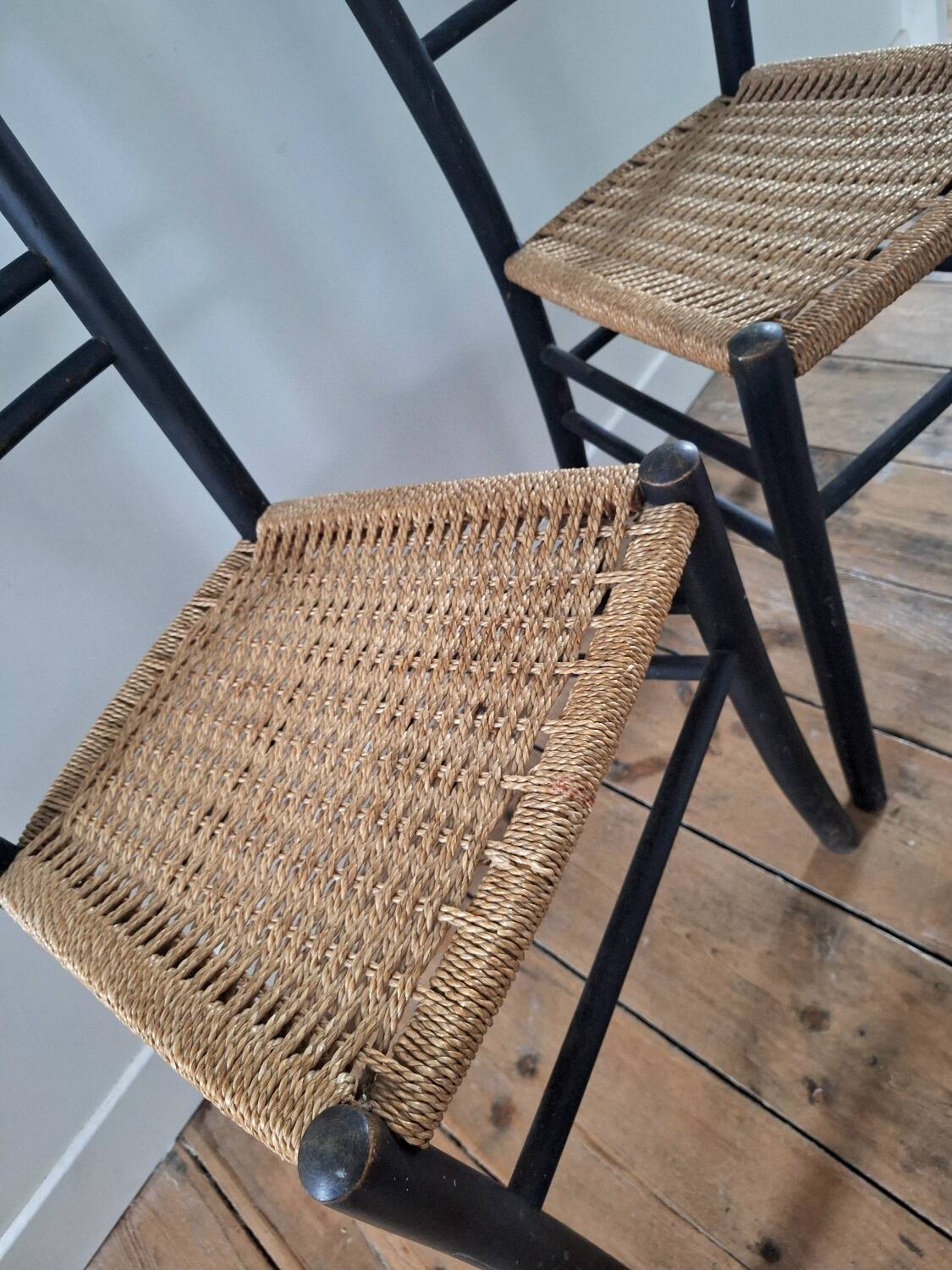 Vintage chairs with woven rope seats, antique seating furniture