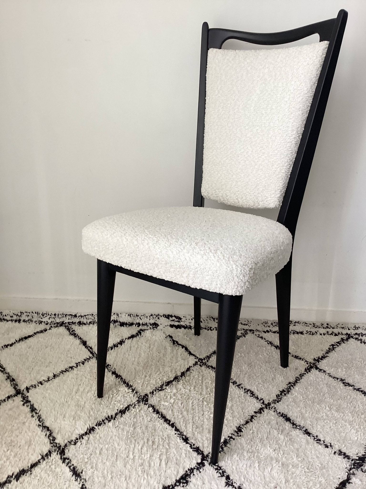 Fully restored vintage chair in boucle fabric.
