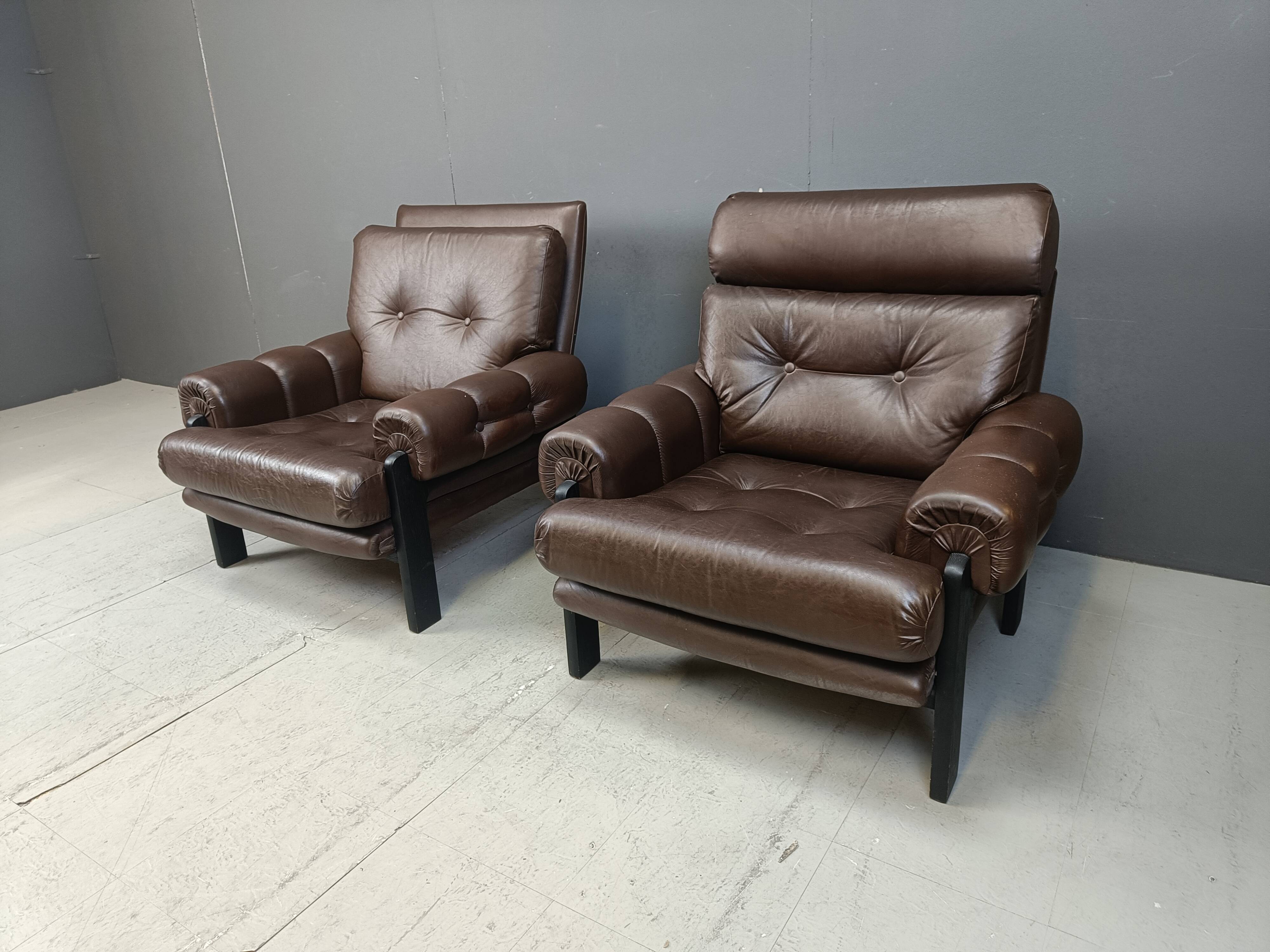 Pair of leather armchairs made in Denmark, 1960s