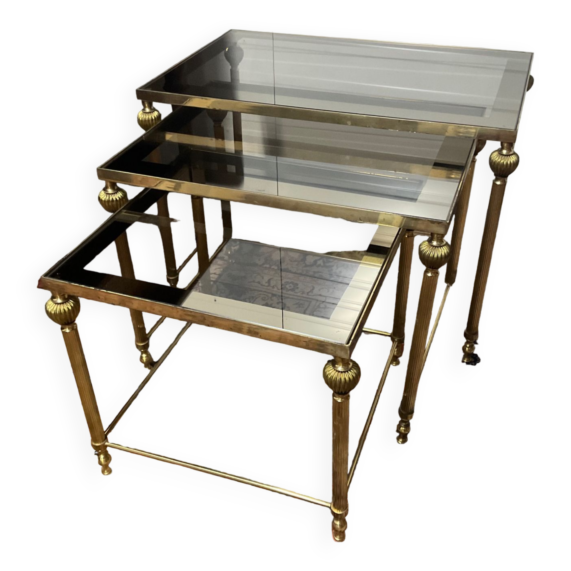 Series of 3 empire style nesting tables in brass and glass