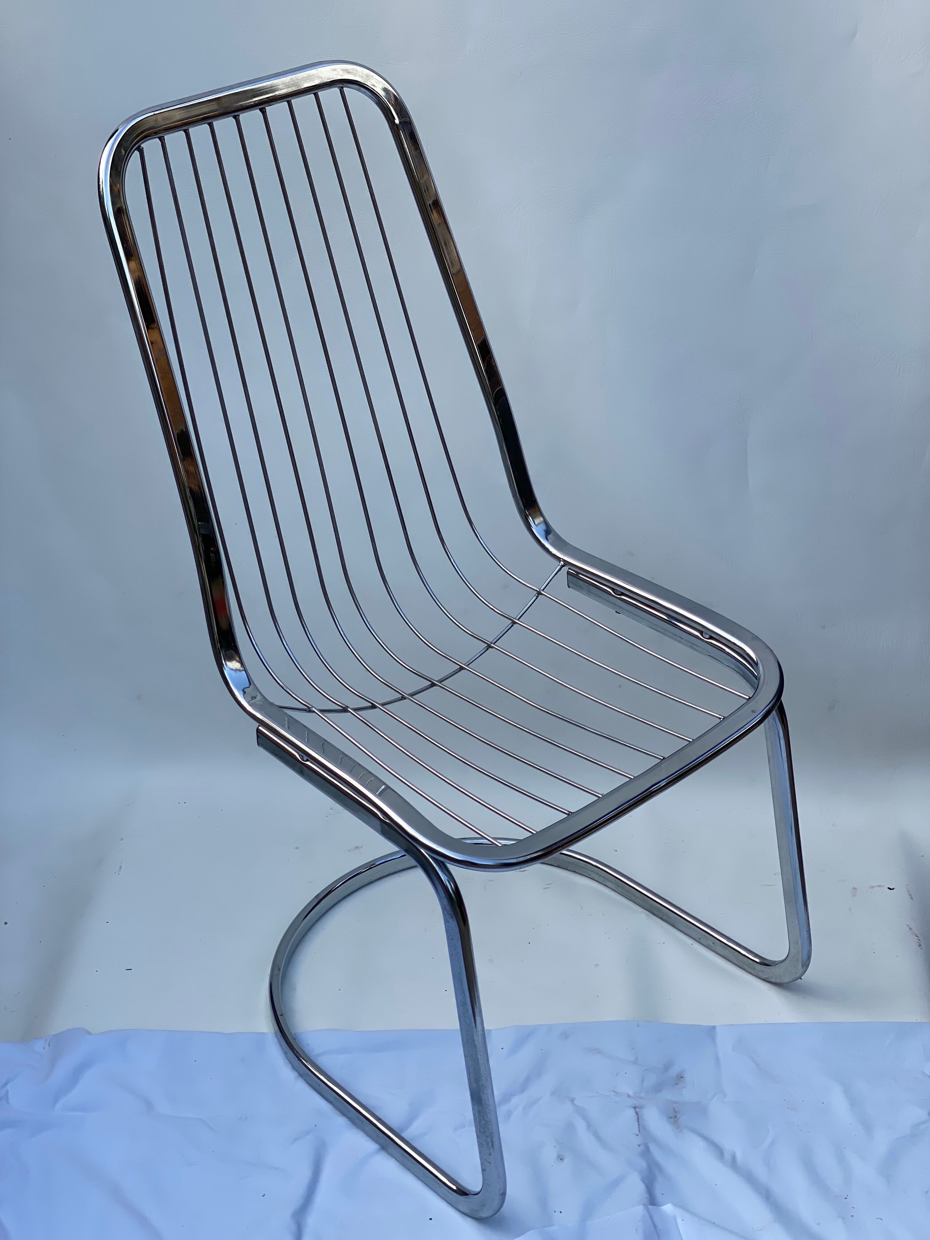 Pair of  gastone rinaldi chrome dining chairs