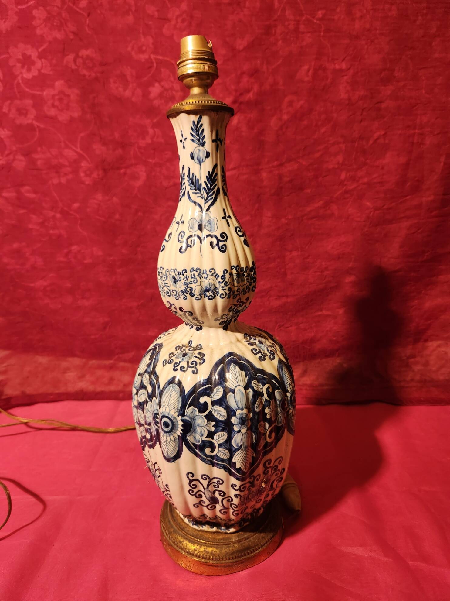 Antique ceramic lamp with brass or bronze base from the attic
