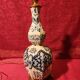 Antique ceramic lamp with brass or bronze base from the attic