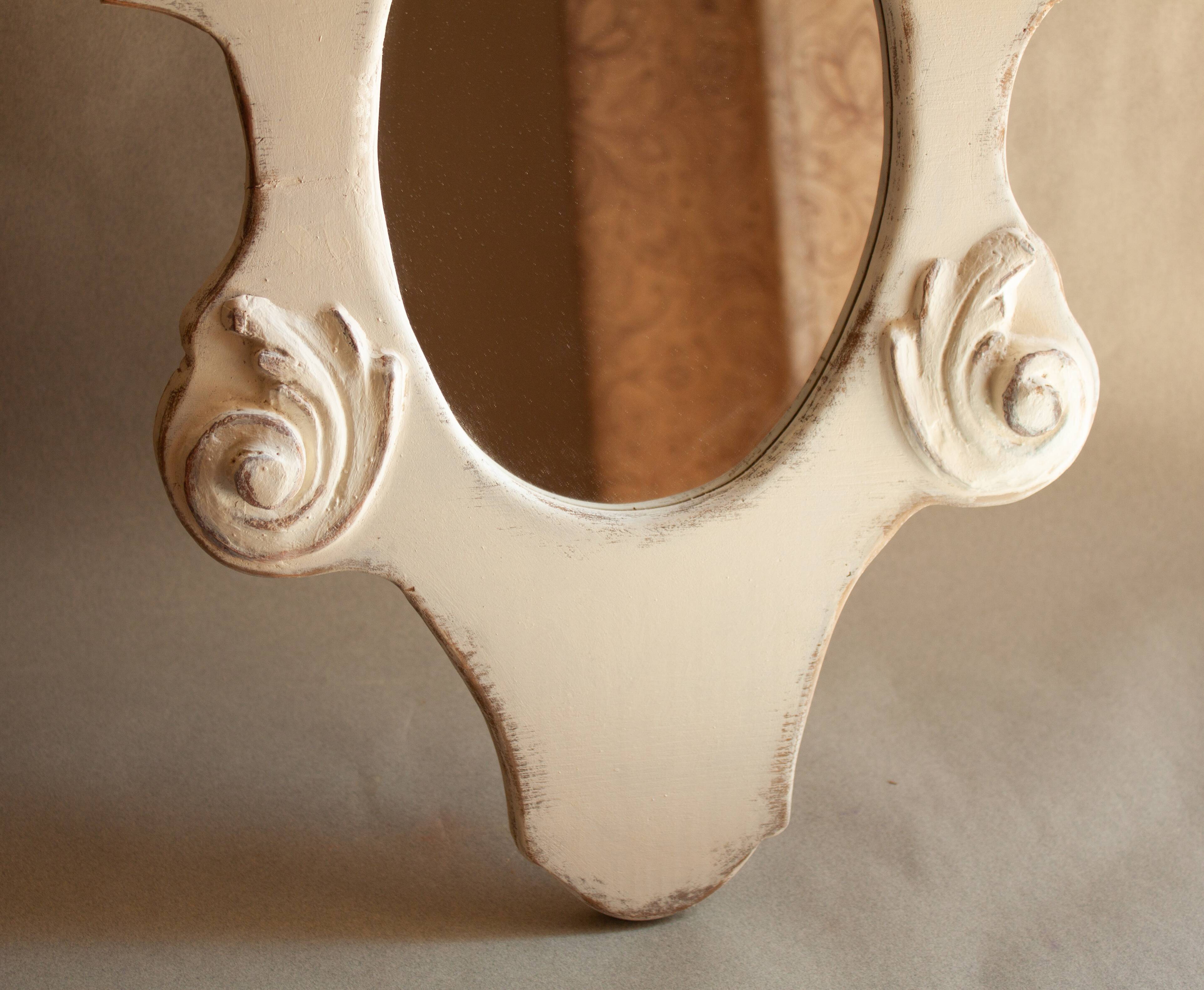 Vintage carved wooden mirror.