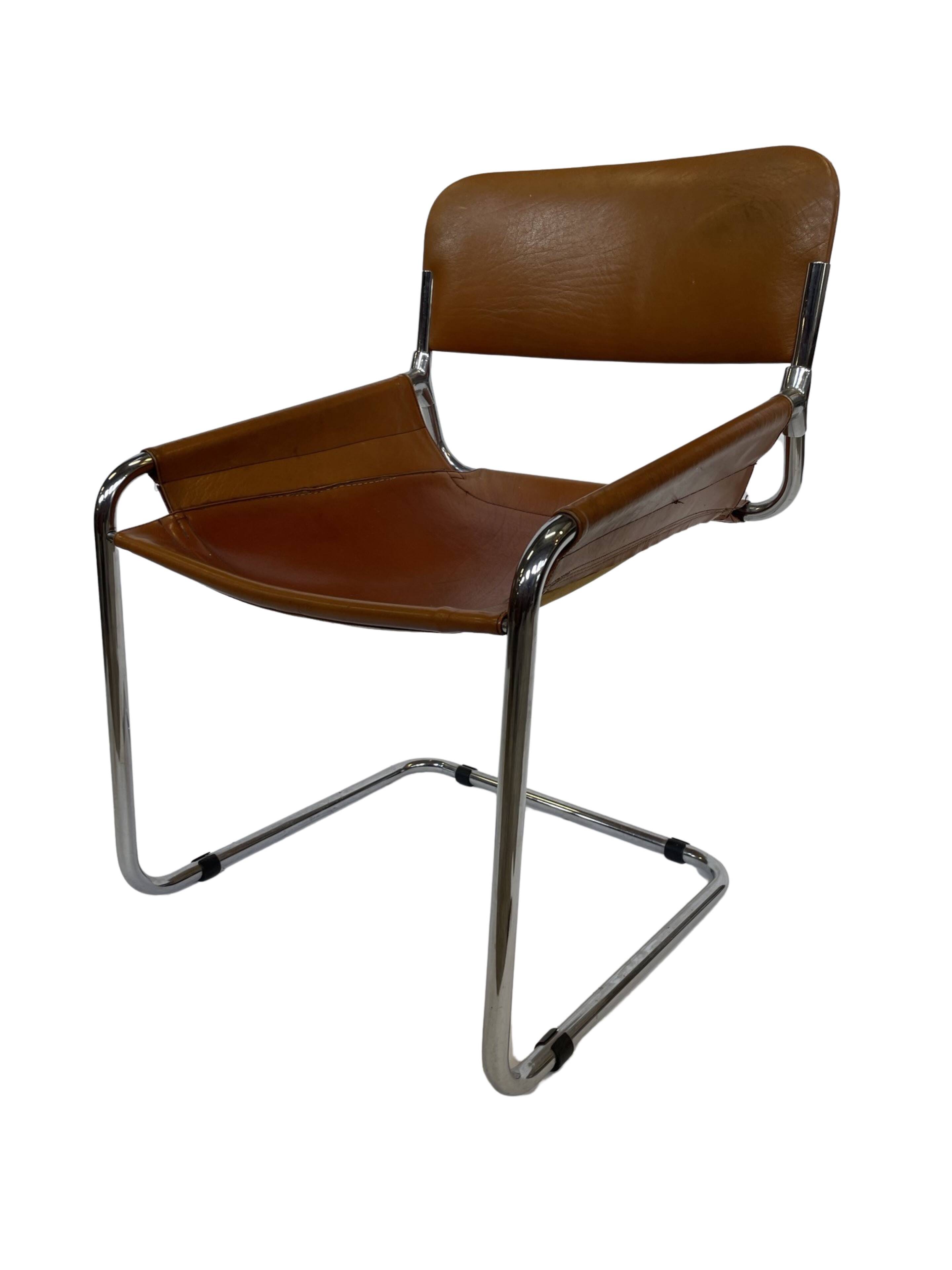vintage dining room chair in cognac leather and chrome 1970s Italy