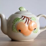 Slush teapot with embossed fruit decoration