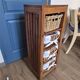 Chest of drawers / Wooden storage column with 4 wicker baskets very