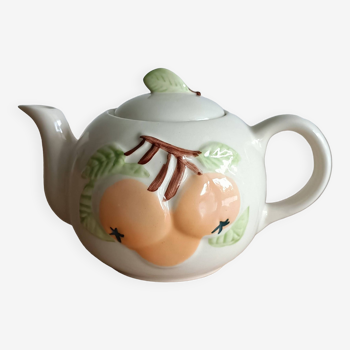 Slush teapot with embossed fruit decoration