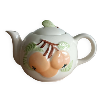 Slush teapot with embossed fruit decoration