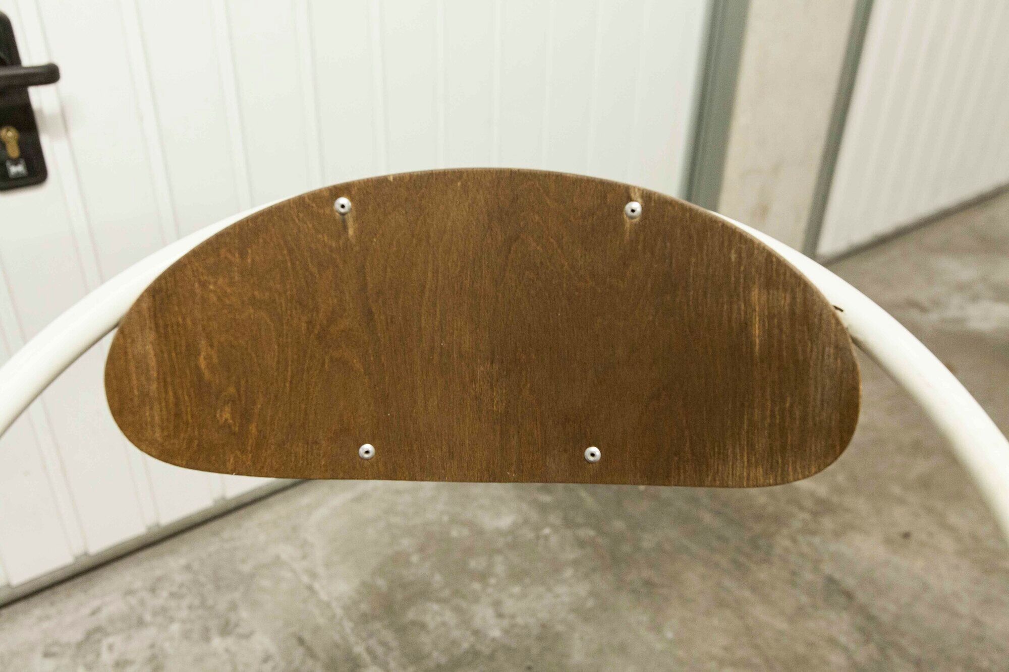 Atypical chair of the 70s metal and wood