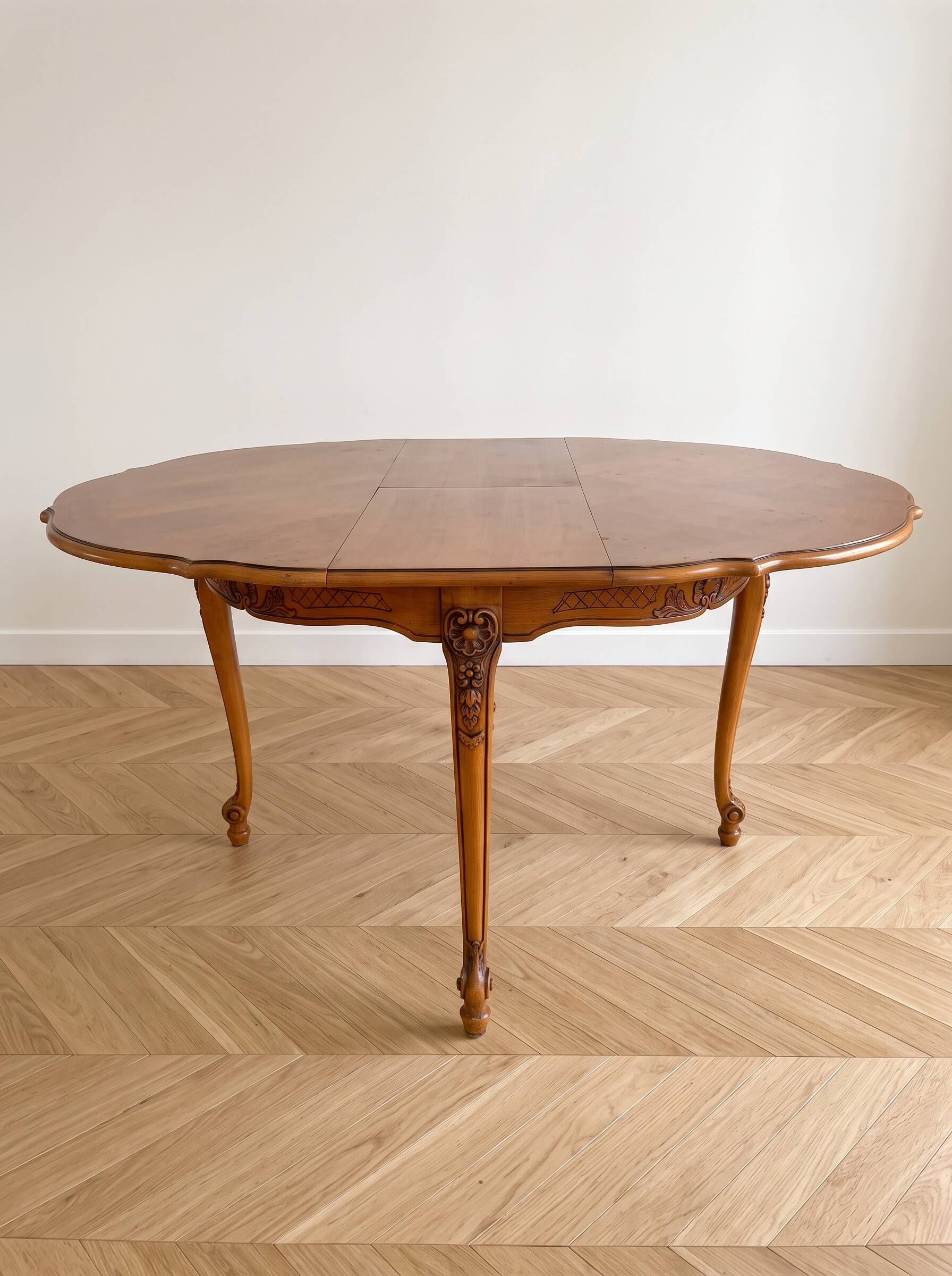Round Louis XV dining table in solid cherry wood.