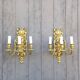 Pair of antique bronze wall sconces from the Napoleonic III era in the Louis XVI style.