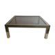 Coffee table in chromed metal and brass