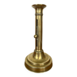Antique brass push candle holder