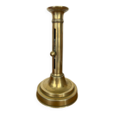 Antique brass push candle holder