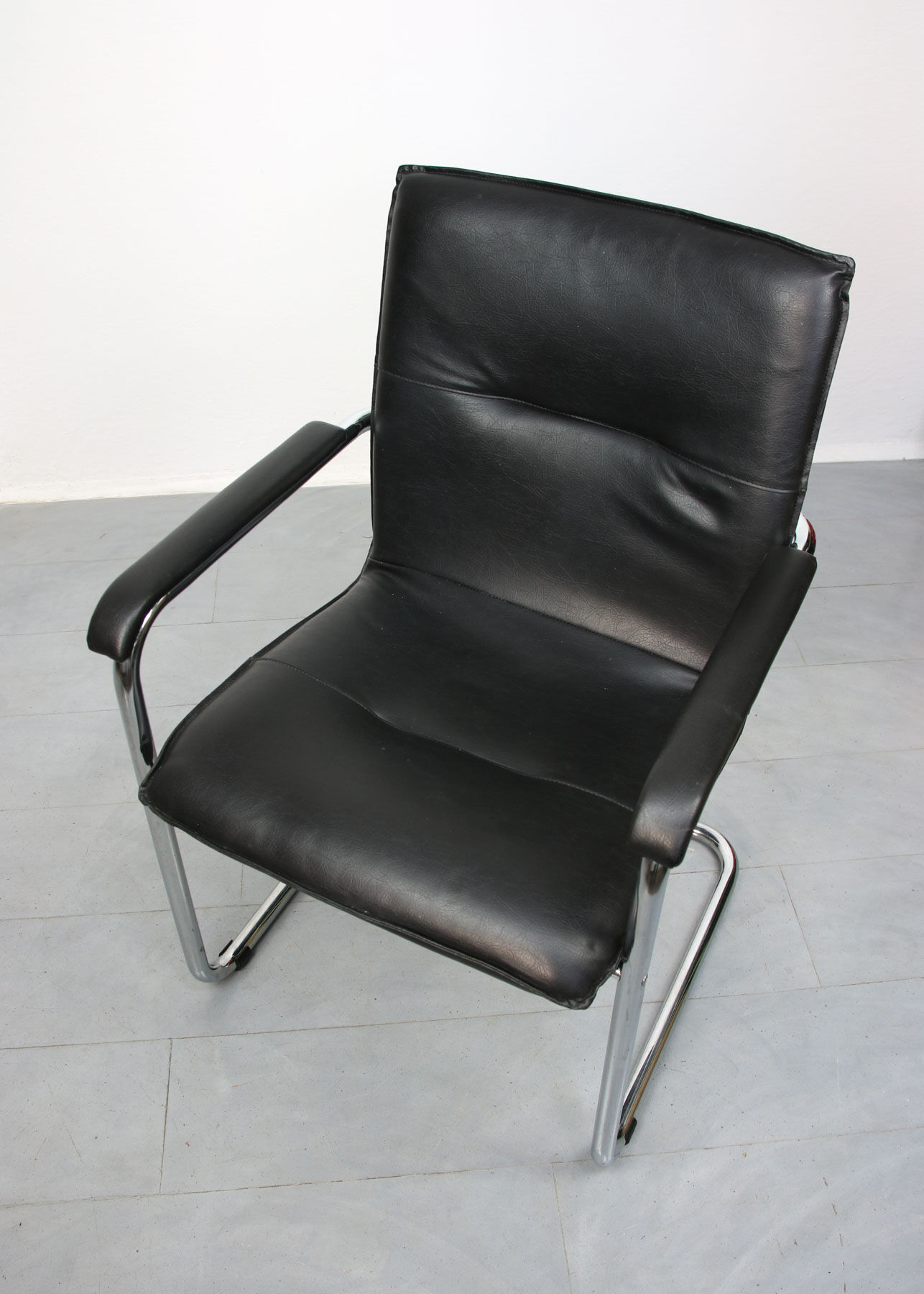 Vintage black leatherette office cantilever chair, 1970s