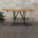 Metal and wood table, black Opaxit top, Czech Republic 1960