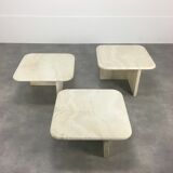 Three travertine trundle coffee tables