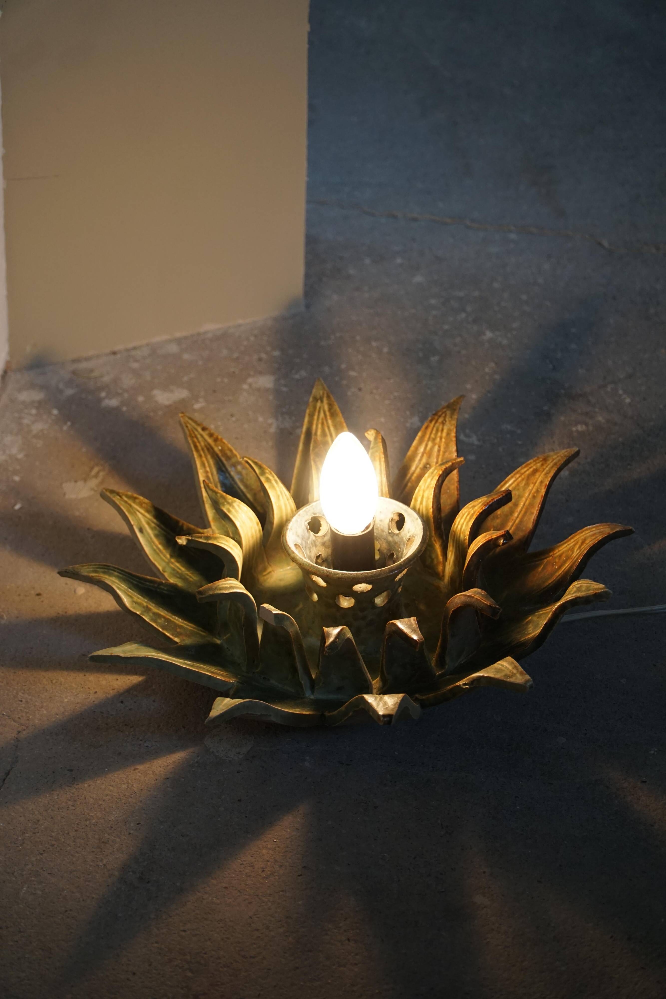 Mid-20th century ceramic sun wall lamp or decorative wall sculpture, 1960s.