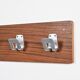 Wall coat rack and lights by Pierre Guariche for La Plagne, around 1968.